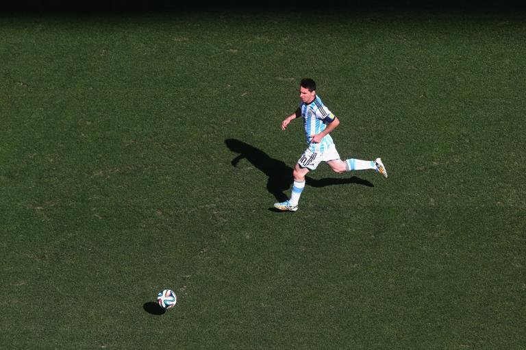 SAO PAULO, BRAZIL - JULY 01: Lionel Messi of Argentina runs with the ball during the 2014 FIFA World Cup Brazil Round of 16 match between Argentina and Switzerland at Arena de Sao Paulo on July 1, 2014 in Sao Paulo, Brazil. (Photo by Alexander Hassenstein - FIFA/FIFA via Getty Images)