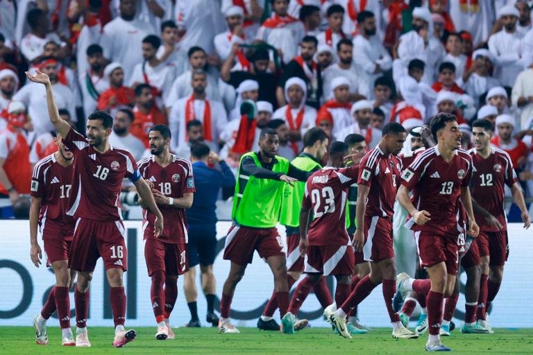 Qatar's players celebrate their opening goal during the FIFA World Cup 2026 Asian qualifier football match between Qatar and the UAE at Jassim Bin Hamad Stadium in Doha on October 14, 2025. (Photo by Karim JAAFAR / AFP) (Photo by KARIM JAAFAR/AFP via Getty Images)