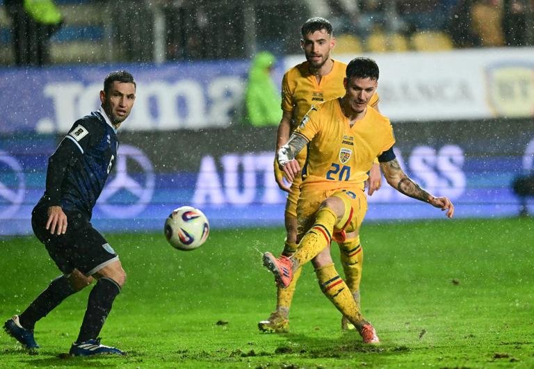 Romania's forward #20 Dennis Man scores the 3-1 during the FIFA World Cup 2026 European qualification Group H football match between Romania and San Marino, in Bucharest, on November 18, 2025. (Photo by Daniel MIHAILESCU / AFP) (Photo by DANIEL MIHAILESCU/AFP via Getty Images)
